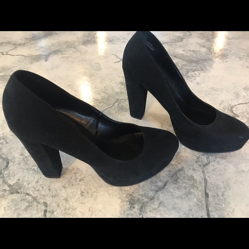 Black platform pumps